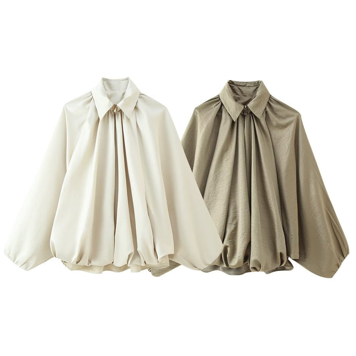 Kvinnors elegant blus med moderna veck och voluminösa ärmar Mirla-Eva Jonsson