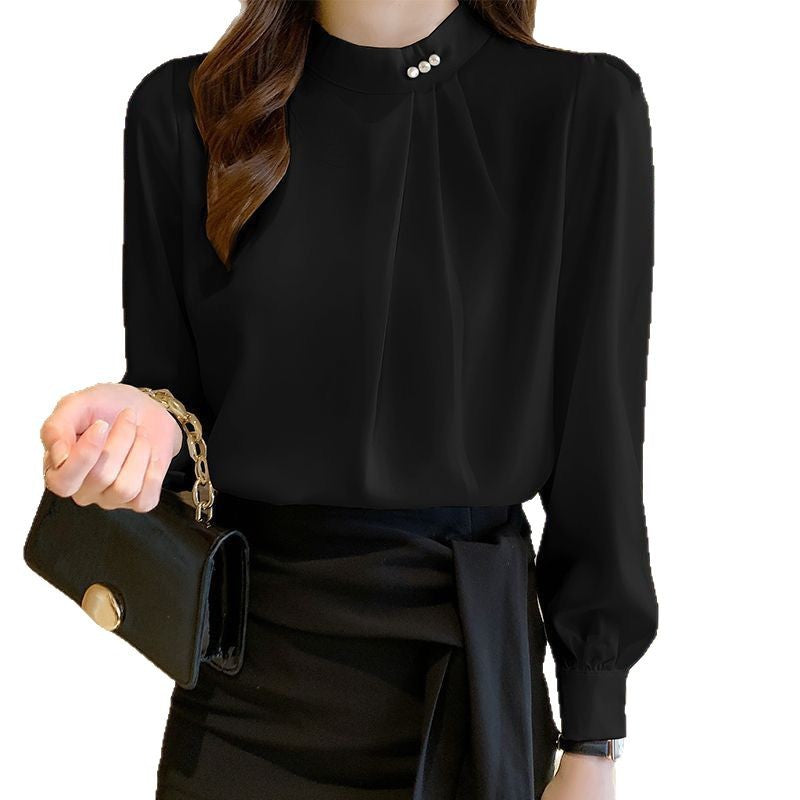 Kvinnors elegant blus med volangdetaljer och stiligt krage Mirla-Eva Jonsson