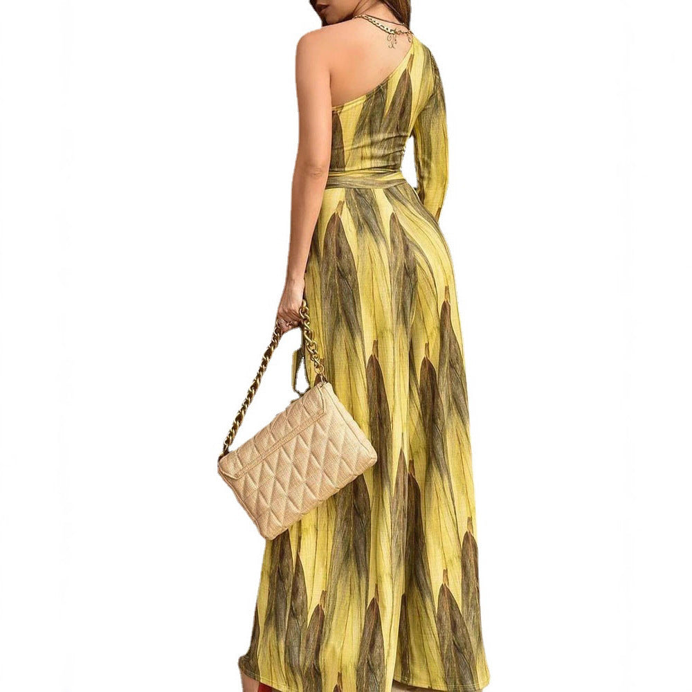 Kvinnors elegant jumpsuit med asymmetrisk skärning och blommönster-Eva Jonsson