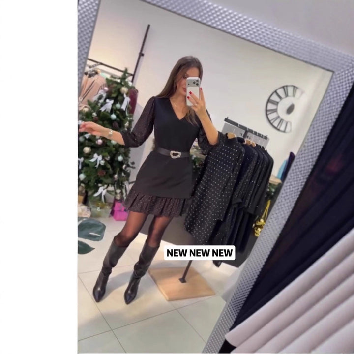 Kvinnors elegant klänning med transparenta puffärmar och stängningsbälte Mirla-Eva Jonsson
