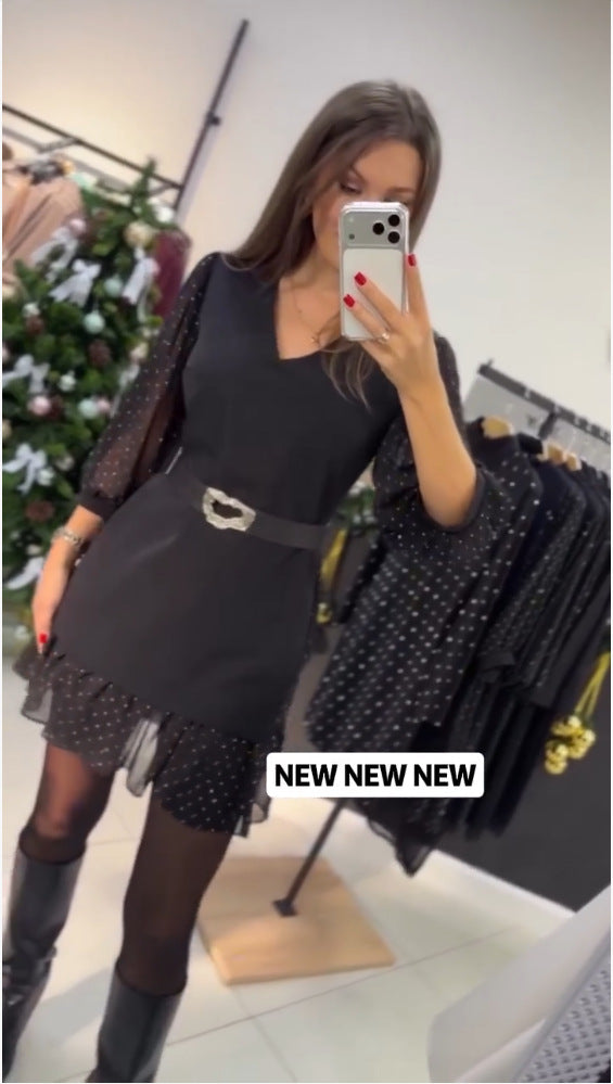 Kvinnors elegant klänning med transparenta puffärmar och stängningsbälte Mirla-Eva Jonsson