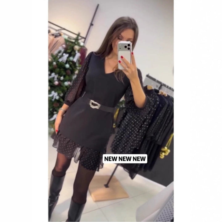 Kvinnors elegant klänning med transparenta puffärmar och stängningsbälte Mirla-Eva Jonsson