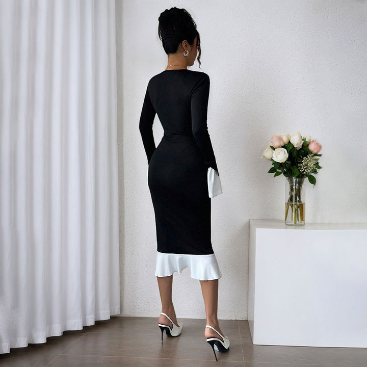 Kvinnors elegant klänning med volangdetaljer och vida ärmar Mirla-Eva Jonsson