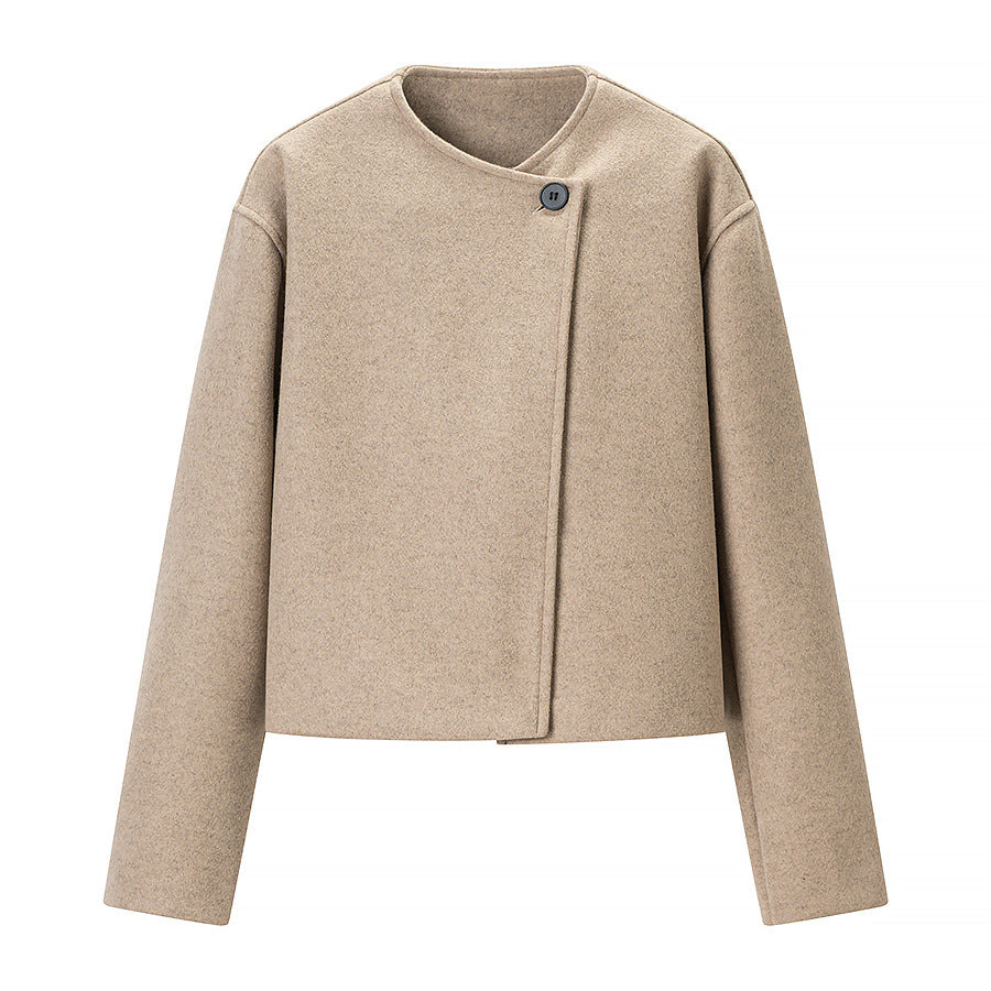 Kvinnors elegant kort jacka i modern design med asymmetrisk skärning Mirla-Eva Jonsson