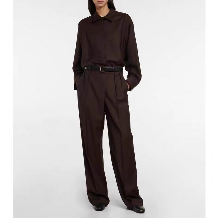 Kvinnors elegant långärmad blus med minimalistisk knappslå Mirla-Eva Jonsson