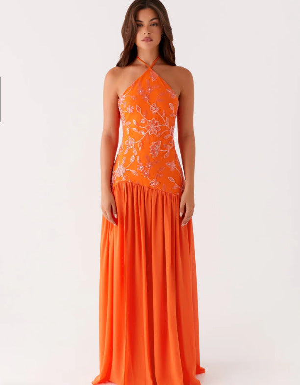 Kvinnors elegant maxi klänning med blommönster och flödande kjol-Eva Jonsson