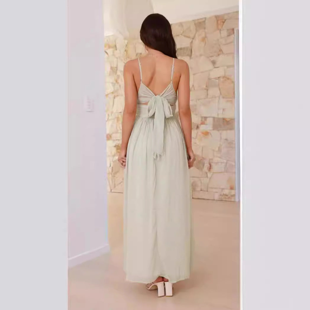 Kvinnors elegant maxi klänning med djup V-ringning och flödande kjol Mirla-Eva Jonsson