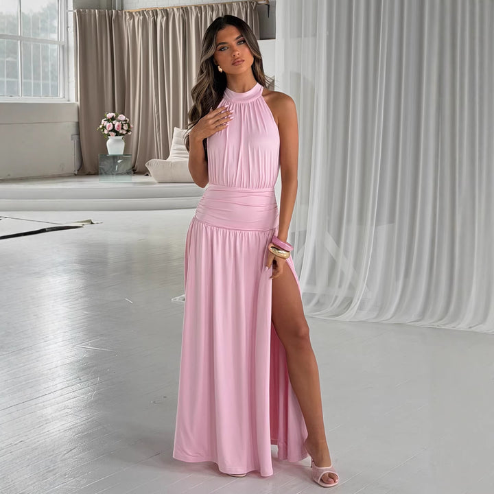 Kvinnors elegant maxi klänning med skimrande tyg och hög slits Mirla-Eva Jonsson