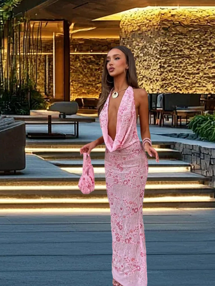 Kvinnors elegant maxi klänning med sofistikerad draperingsdesign och blommönster-Eva Jonsson