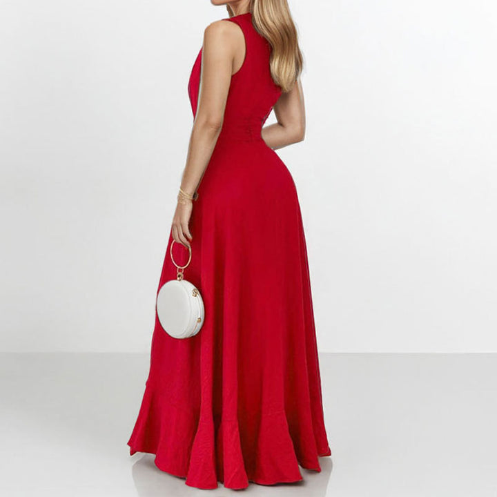 Kvinnors elegant maxiklänning med asymmetrisk fåll och volangdetaljer Mirla-Eva Jonsson