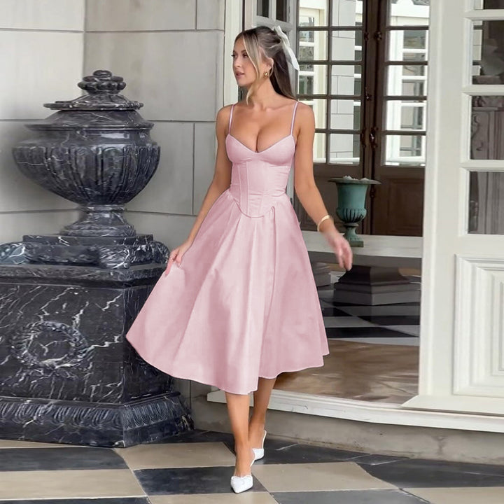 Kvinnors elegant maxiklänning med åtsittande midja och flödande kjol Mirla-Eva Jonsson
