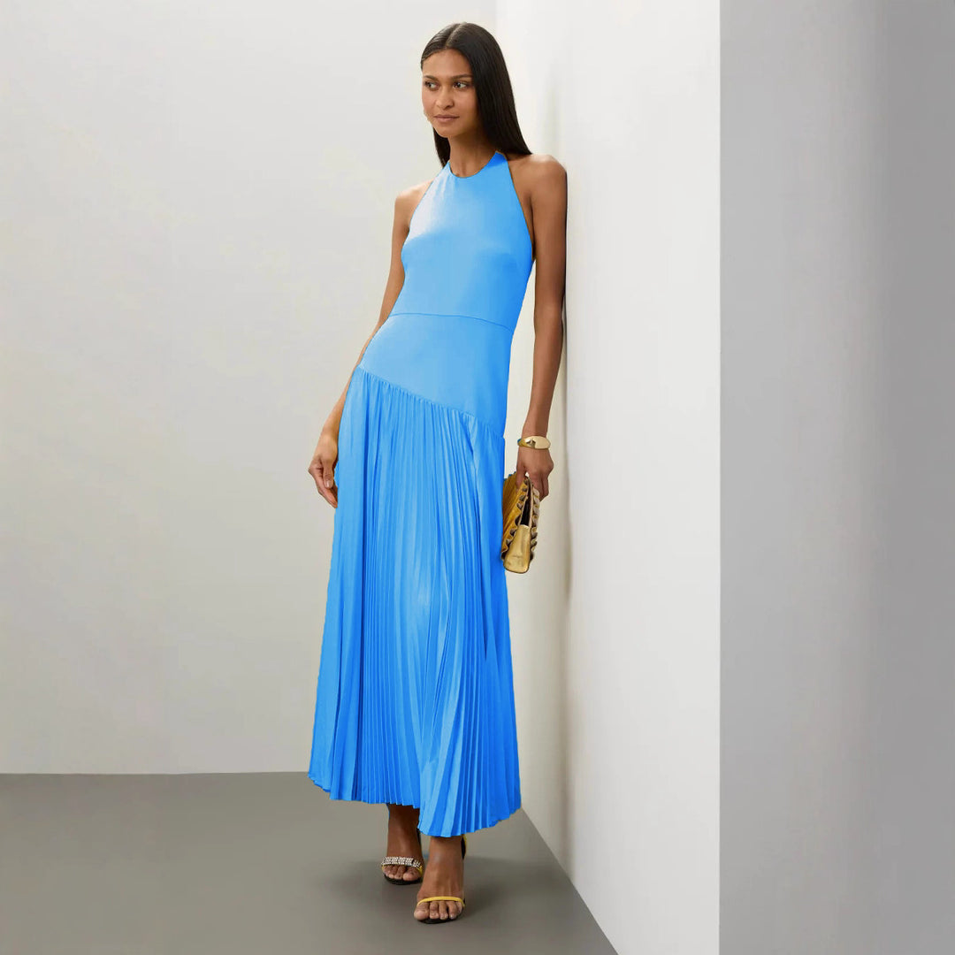 Kvinnors elegant maxiklänning med flödande plisserad kjol och halterneckdesign-Eva Jonsson