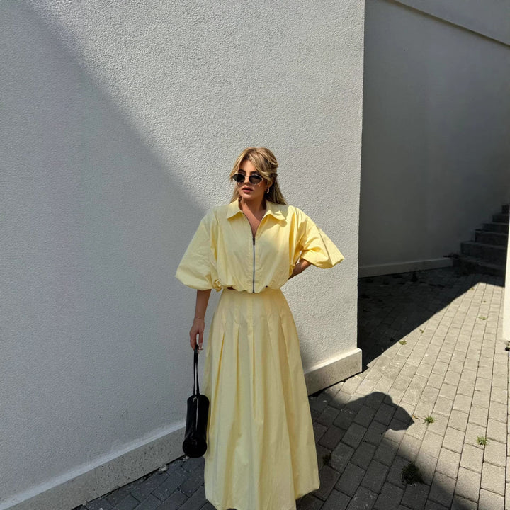 Kvinnors elegant maxiklänning med hög hals och bred nederkant-Eva Jonsson