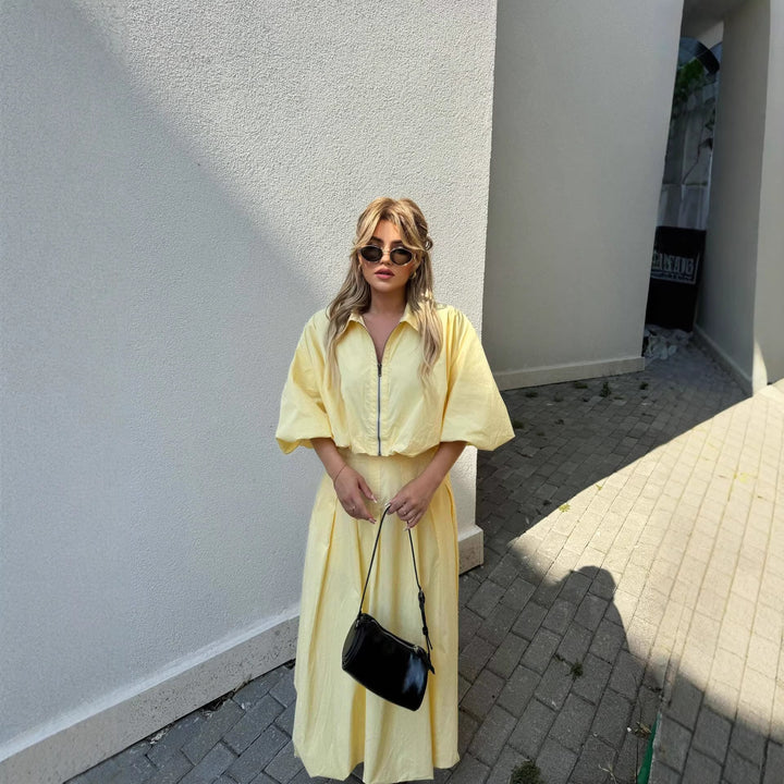 Kvinnors elegant maxiklänning med hög hals och bred nederkant-Eva Jonsson