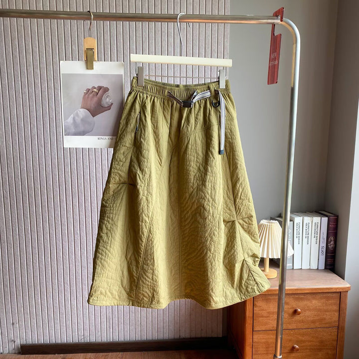 Kvinnors elegant midi kjol med praktisk elastisk midja och sidofickor Mirla-Eva Jonsson