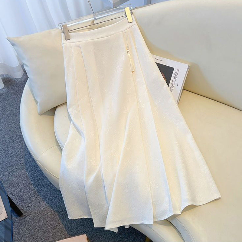 Kvinnors elegant midi kjol med texturerad tyg och flytande snitt-Eva Jonsson