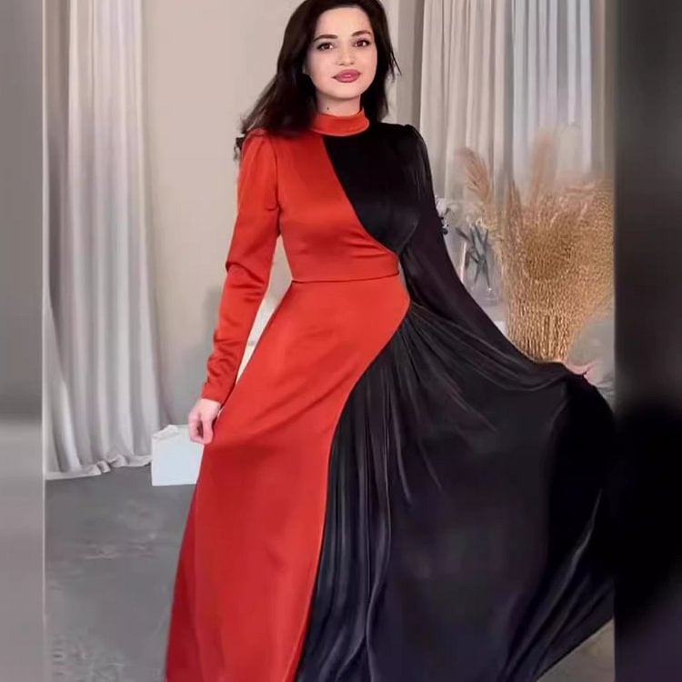 Kvinnors elegant och asymmetrisk aftonklänning med veckdetaljer Mirla-Eva Jonsson