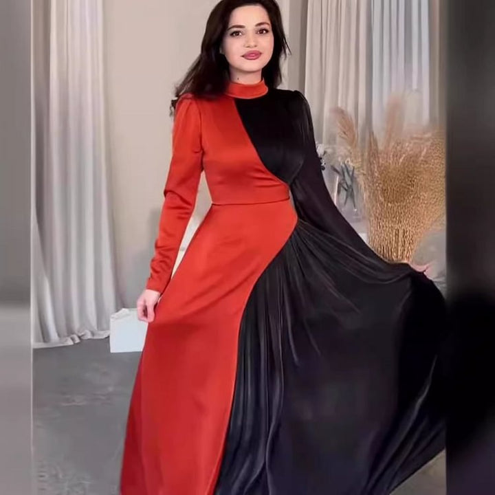 Kvinnors elegant och asymmetrisk aftonklänning med veckdetaljer Mirla-Eva Jonsson