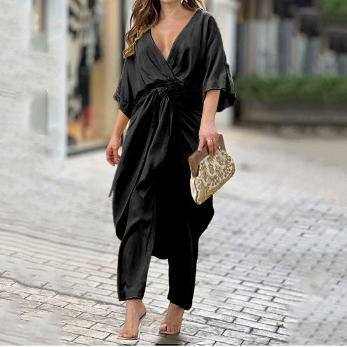 Kvinnors elegant omslag jumpsuit med avslappnad design och midjedefinition Mirla-Eva Jonsson