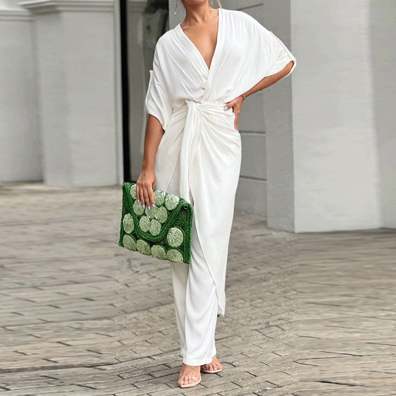 Kvinnors elegant omslag jumpsuit med avslappnad design och midjedefinition Mirla-Eva Jonsson