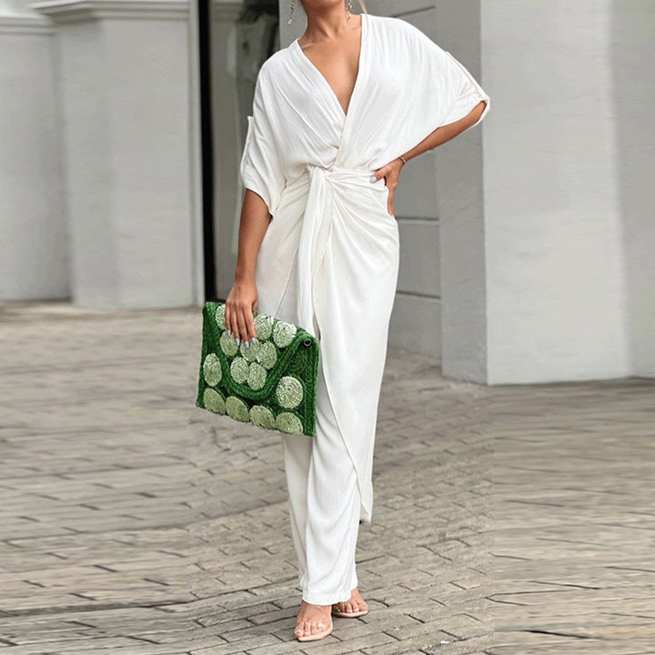 Kvinnors elegant omslag jumpsuit med avslappnad design och midjedefinition Mirla-Eva Jonsson
