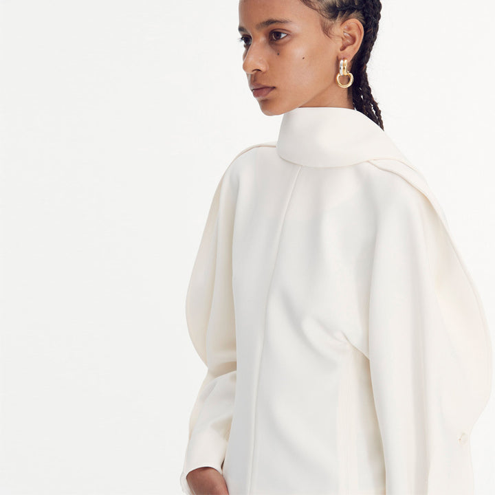 Kvinnors elegant oversize-jacka med hög krage och moderna detaljer Mirla-Eva Jonsson