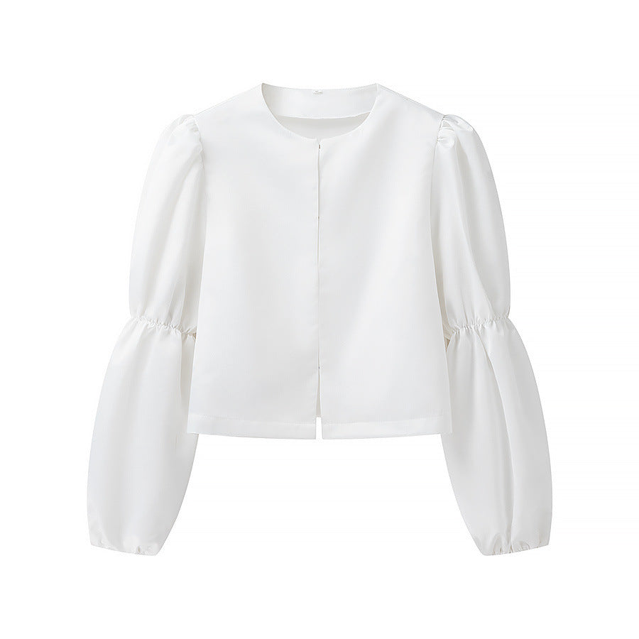 Kvinnors elegant skräddarsydda blus med voluminösa ärmar Mirla-Eva Jonsson