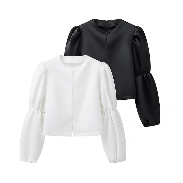 Kvinnors elegant skräddarsydda blus med voluminösa ärmar Mirla-Eva Jonsson