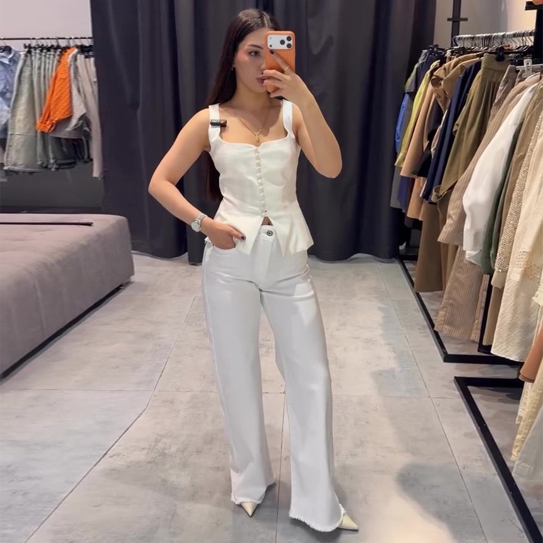 Kvinnors elegant topp med skräddarsydd passform och dekorativa knappar Mirla-Eva Jonsson