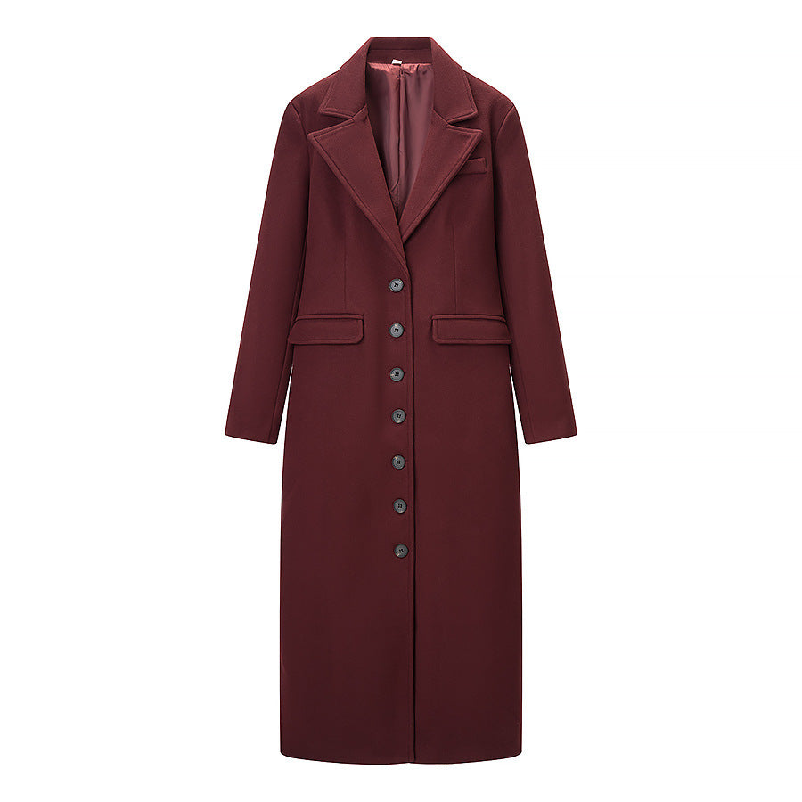 Kvinnors elegant trench coat i minimalistisk design med praktiska fickor Mirla-Eva Jonsson