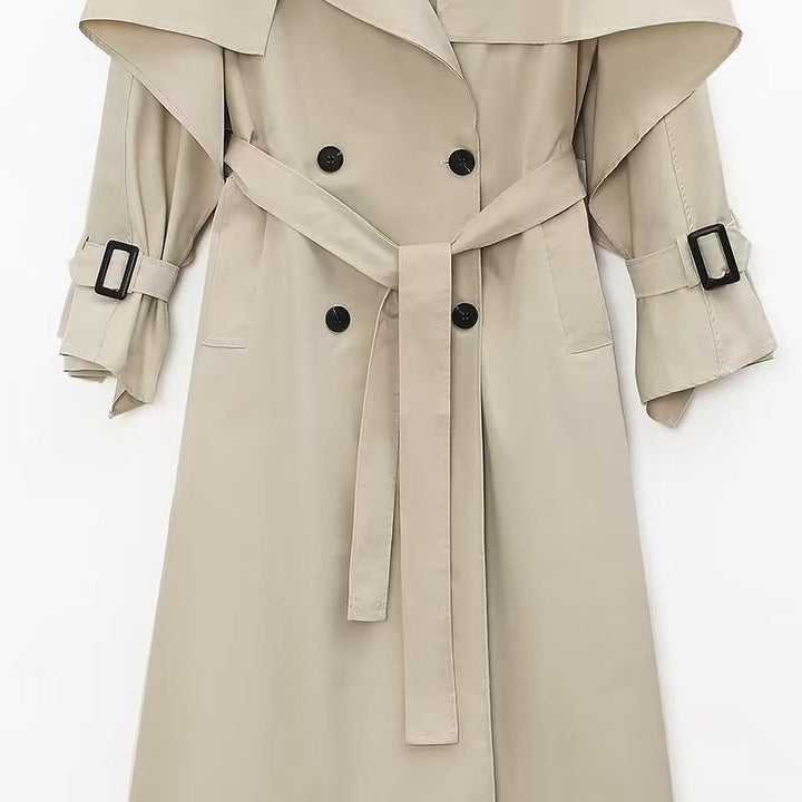 Kvinnors elegant trenchcoat med bälte och oversized krage Mirla-Eva Jonsson