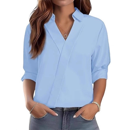 Kvinnors eleganta V-halsblus med texturerad design Mirla-Eva Jonsson