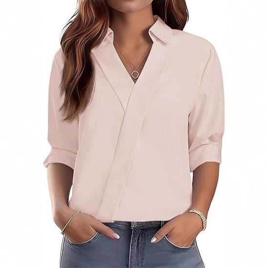 Kvinnors eleganta V-halsblus med texturerad design Mirla-Eva Jonsson