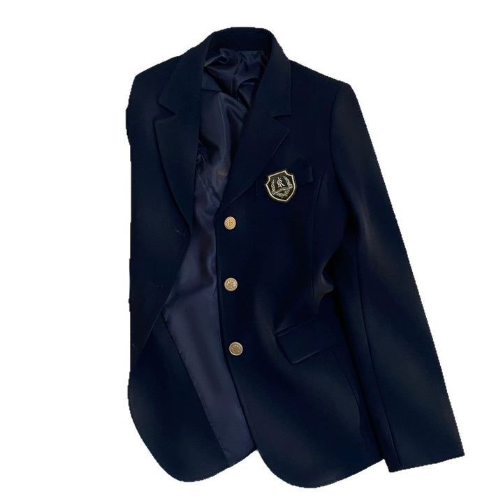 Kvinnors eleganta blazer med gyllene knappar och emblem Mirla-Eva Jonsson