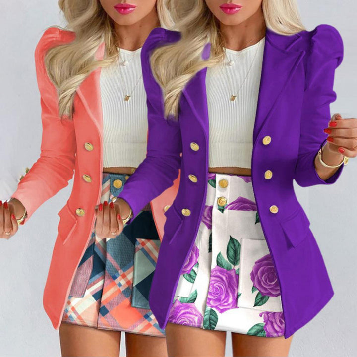 Kvinnors eleganta blazer med puffärmar och gyllene knapppdetaljer Mirla-Eva Jonsson