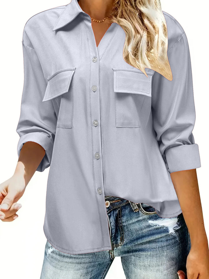 Kvinnors eleganta blus med fickor och stilren skärning Mirla-Eva Jonsson
