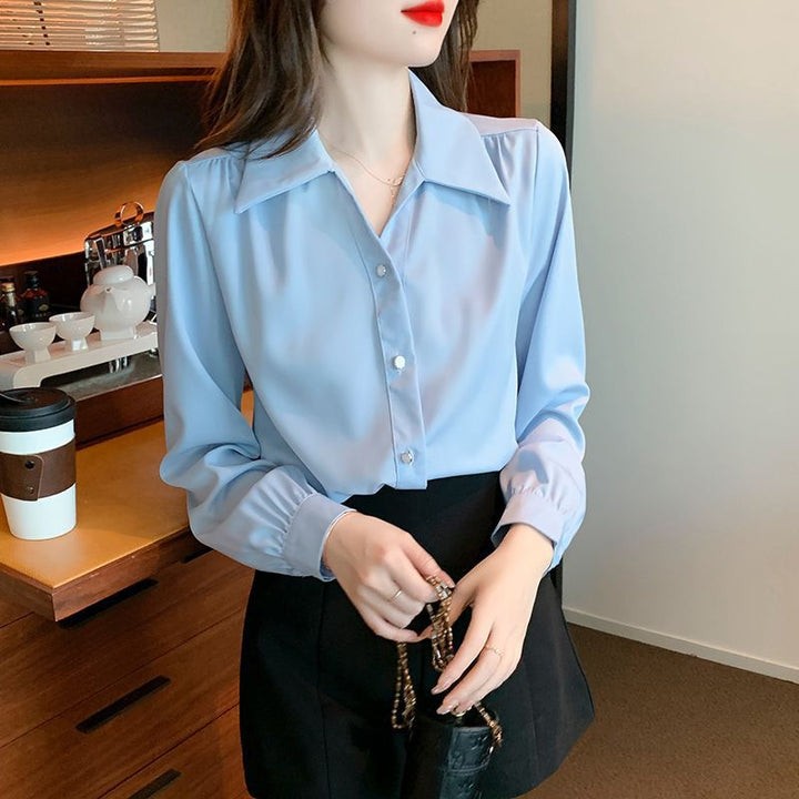 Kvinnors eleganta blus med klassiska detaljer Mirla-Eva Jonsson