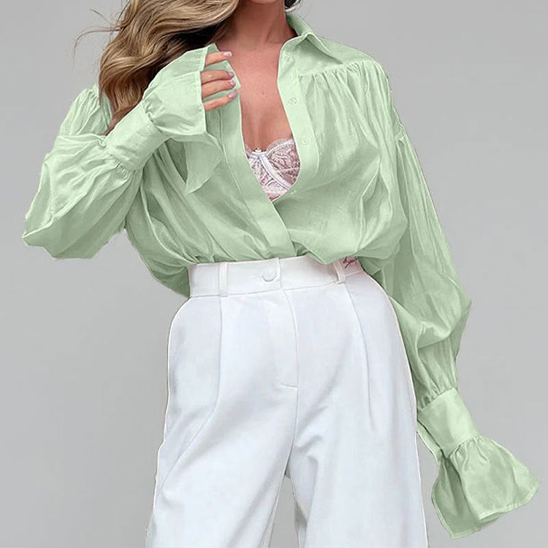 Kvinnors eleganta blus med lös passform och ballongsformade ärmar Mirla-Eva Jonsson