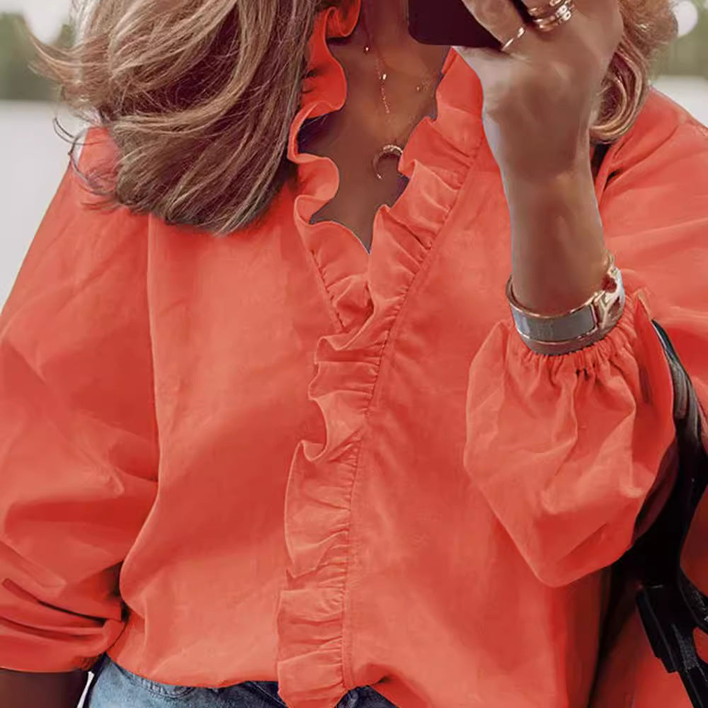Kvinnors eleganta blus med volangdetalj Mirla-Eva Jonsson