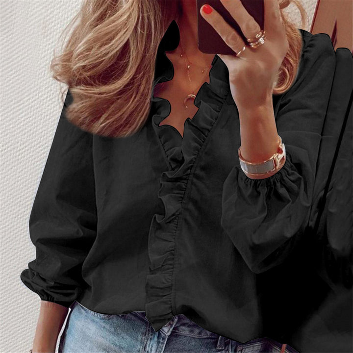 Kvinnors eleganta blus med volangdetalj Mirla-Eva Jonsson