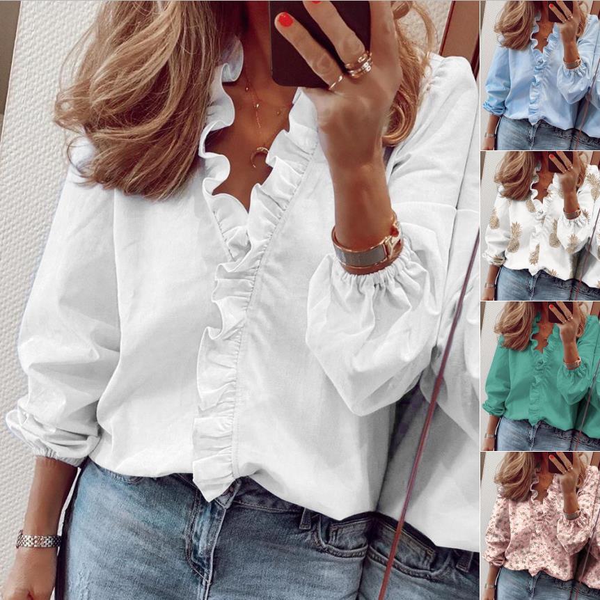 Kvinnors eleganta blus med volangdetalj Mirla-Eva Jonsson