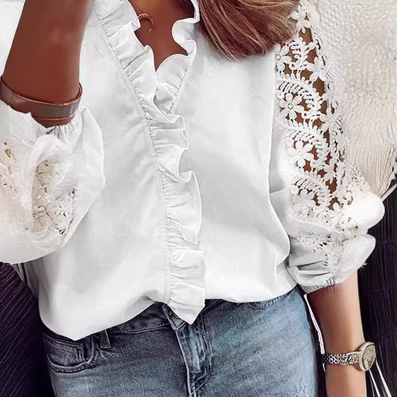 Kvinnors eleganta blus med volangdetaljer och spetsärmar Mirla-Eva Jonsson