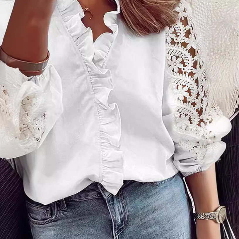 Kvinnors eleganta blus med volangdetaljer och spetsärmar Mirla-Eva Jonsson