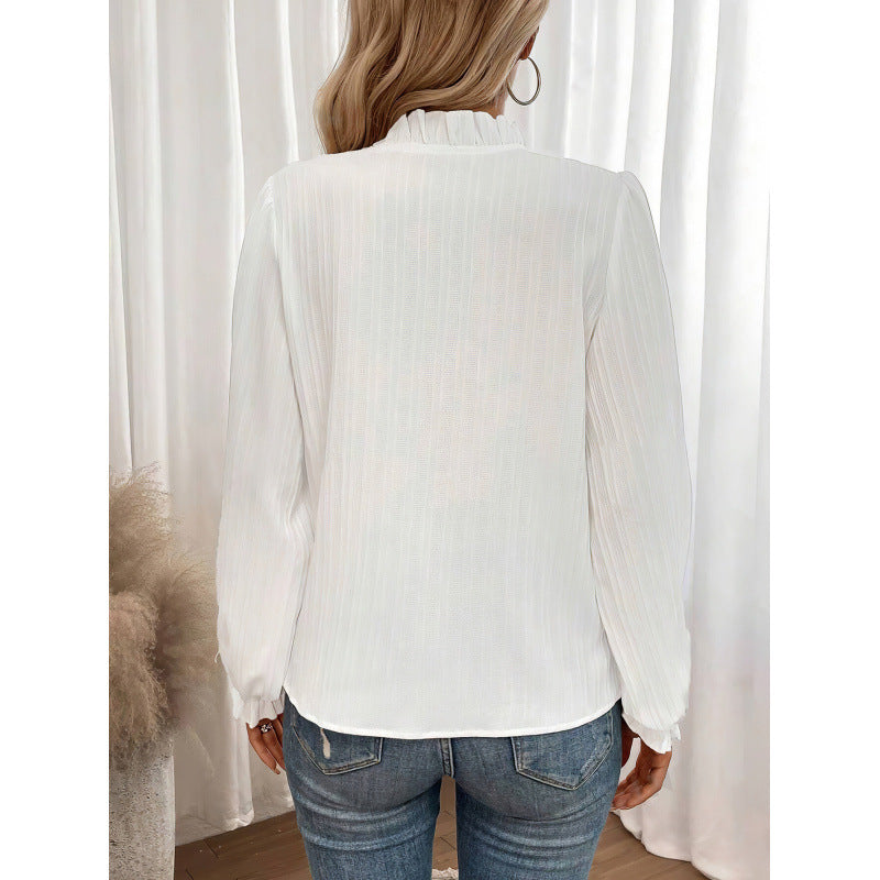 Kvinnors eleganta blus med volangdetaljer och veck-Eva Jonsson