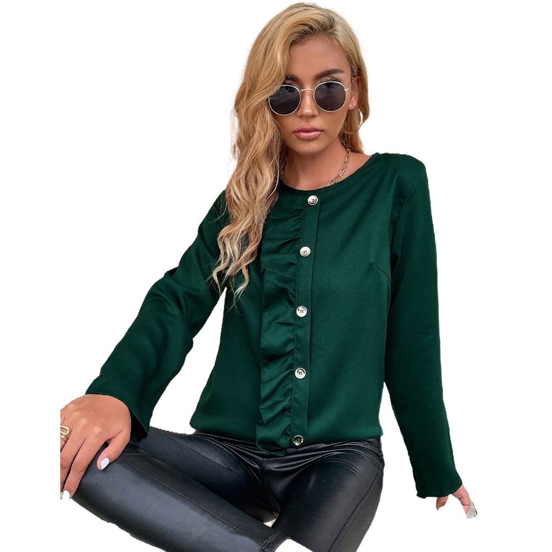 Kvinnors eleganta blus med volanger och knappdetaljer Mirla-Eva Jonsson