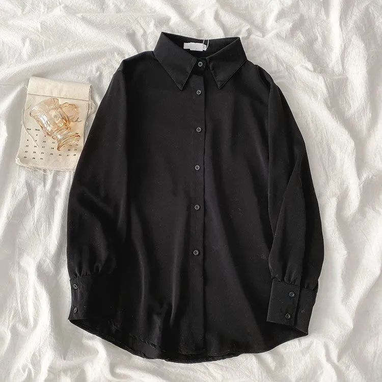 Kvinnors eleganta blus med voluminösa ärmar Mirla-Eva Jonsson