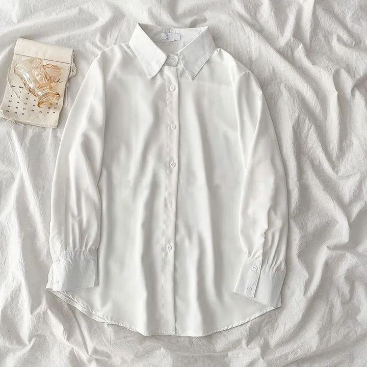 Kvinnors eleganta blus med voluminösa ärmar Mirla-Eva Jonsson