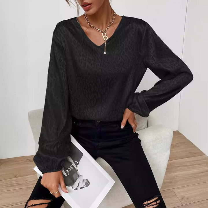 Kvinnors eleganta blus topp med V-hals och voluminösa ärmar Mirla-Eva Jonsson