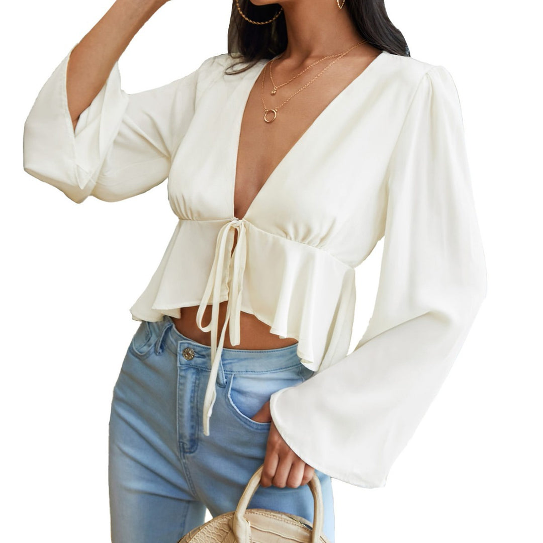 Kvinnors eleganta blus topp med djup V-hals och knyt detaljer Mirla-Eva Jonsson
