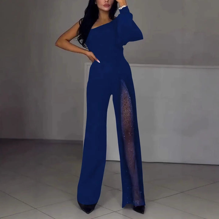 Kvinnors eleganta byxdress med spännande transparenta detaljer Mirla-Eva Jonsson